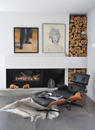 http://www.homedit.com/cool-firewood-storage-designs/fireplace-reading-corner-iconic-eames-chair-and-firewood-storage/